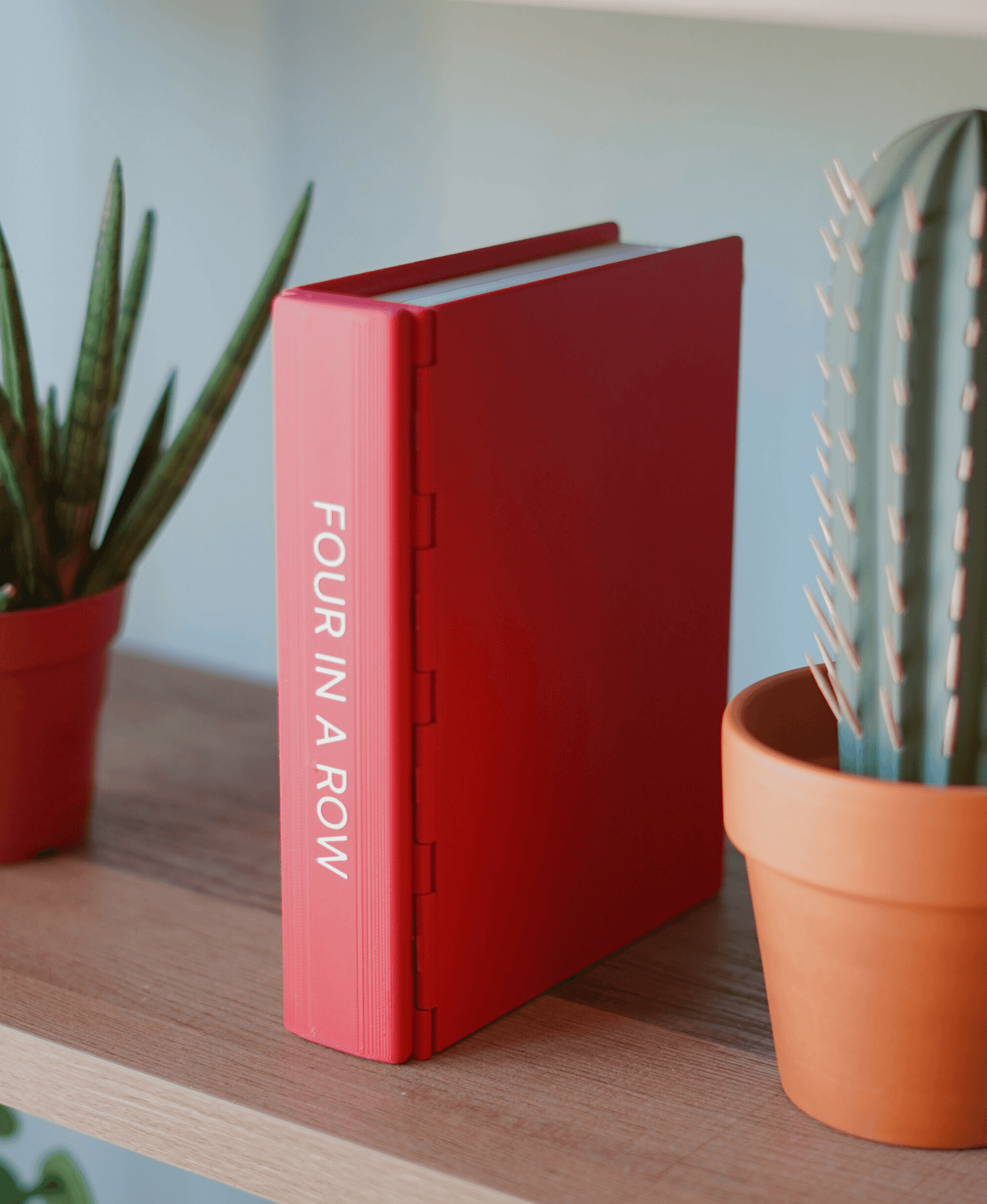 Play Book'd Four in a Row